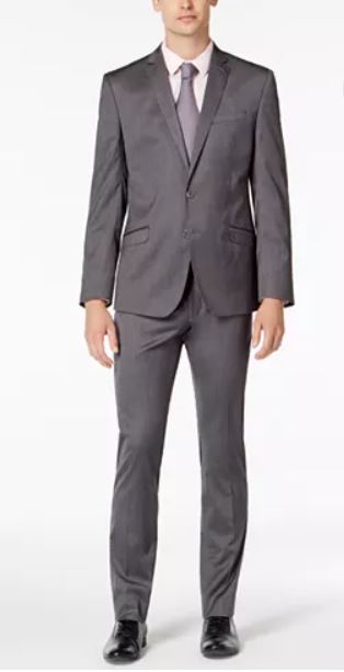 Charcoal grey slim-cut two-piece suit with a lavender tie, white pocket square, and black Oxford shoes shown in a full-length product photo
